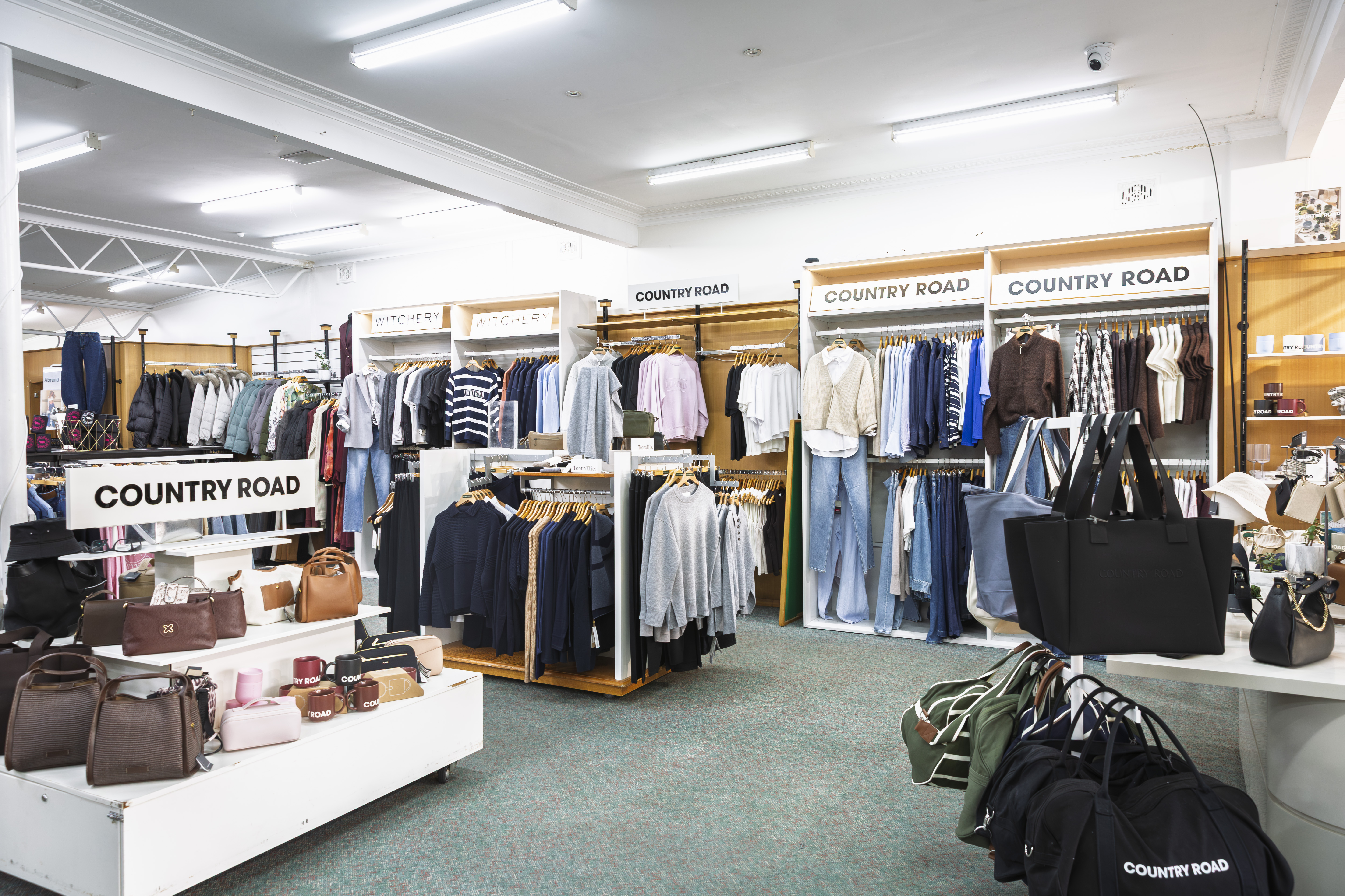 Country Road section inside Stevensons with clothing and accessories on display.